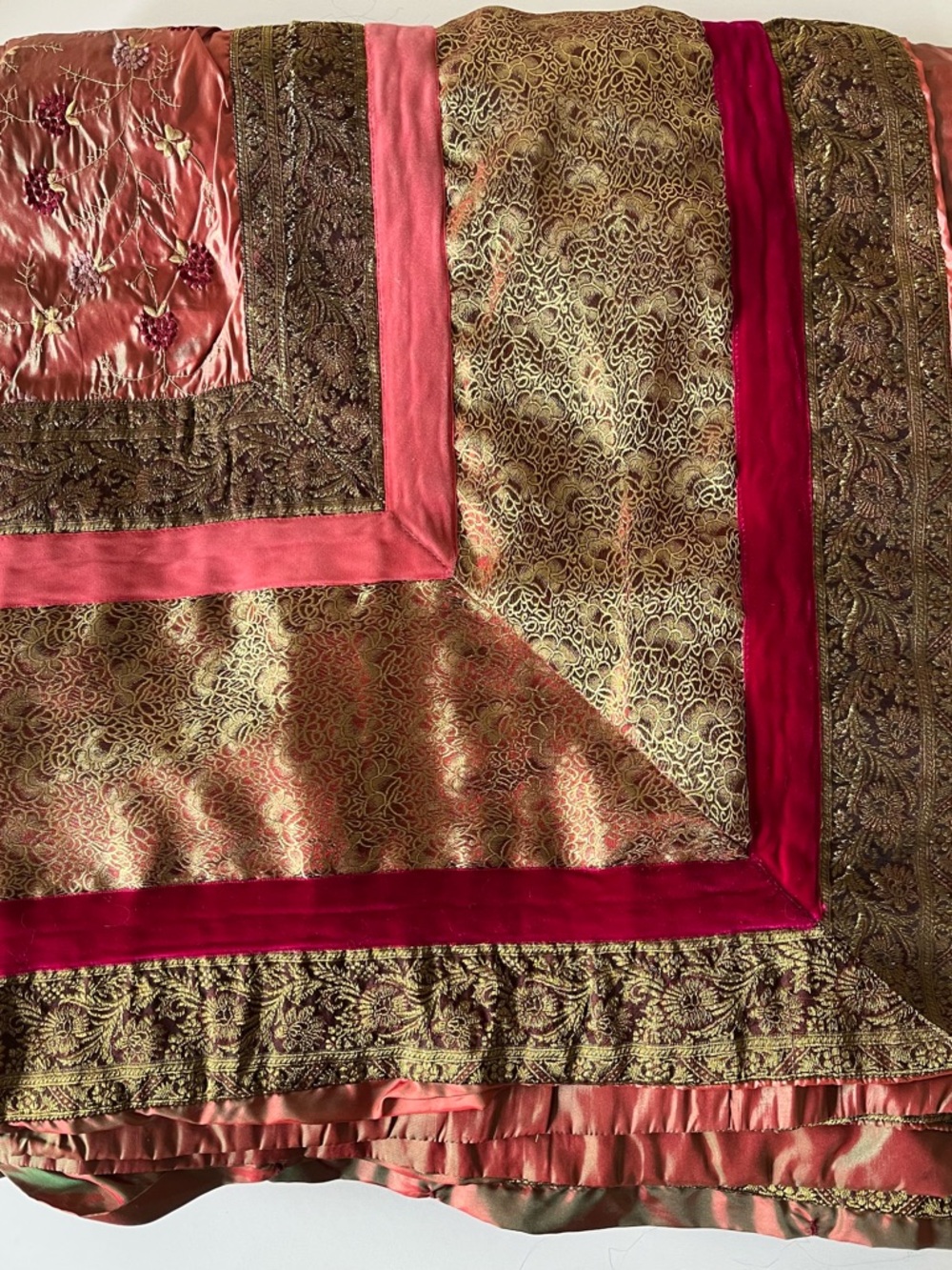 Vintage queen bedspread with copper embroidered brocade and velvet trim.